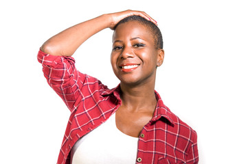 young attractive and natural black afro american woman in casual shirt smiling positive isolated posing cheerful feeling happy and carefre