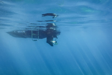 Engine motor boat propeller underwater sea surface