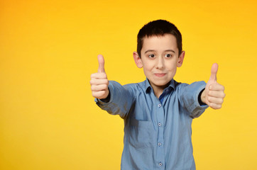 emotional child with bright facial expressions gestures