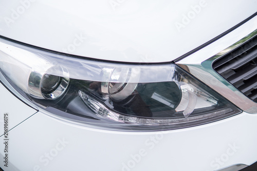 Fényképezés  Modern car headlights.