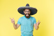 © be free - Celebrate traditions. Man on smiling face in sombrero hat celebrating, yellow background. Guy with beard looks festive in sombrero. Fest and holiday concept. Man in festive mood at party celebrating