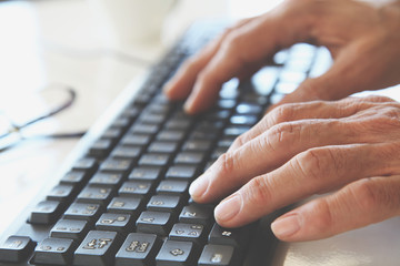 Businessman using computer keyboard