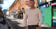 © Mark Adams - Bold young African-American man poses confidently in urban setting