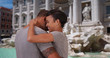 © Mark Adams - Black woman enjoying loving boyfriends company near Trevi Fountain in Rome