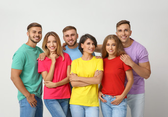 Canvas Print - Group of young people on light background. Unity concept