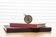 © dohee - vintage compass on the wood table at the office