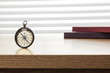 © dohee - vintage compass on the wood table at the office