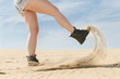 © Gribanov - Female foot digs sand