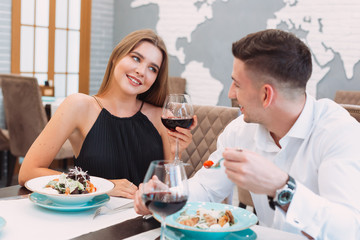 Wall Mural - Beautiful couple in a restaurant