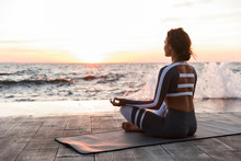 Strong Young Fitness Woman Meditate.
