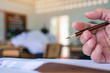 © smolaw11 - Students hands taking exams, writing examination room with holding pencil on optical form of standardized test with answers and english paper sheet on row desk chair doing final exam in classroom.