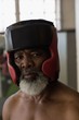 © Wavebreak Media - Portrait of senior boxer in headgear