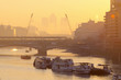 UK, England, London, Canary Wharf skyline at sunrise