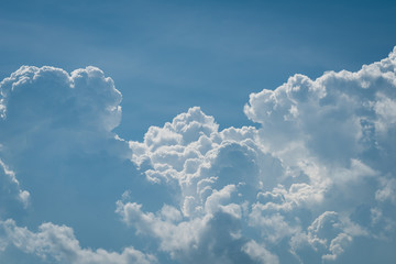 Wall Mural - closeup white cumulus cloud with blue sky for nature background