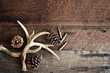 © Stephanie Frey - Real white tail deer antlers used by hunters when hunting to rattle in other large bucks over a rustic wooden table with pine cones and .308 rifle shells. Free space for text.