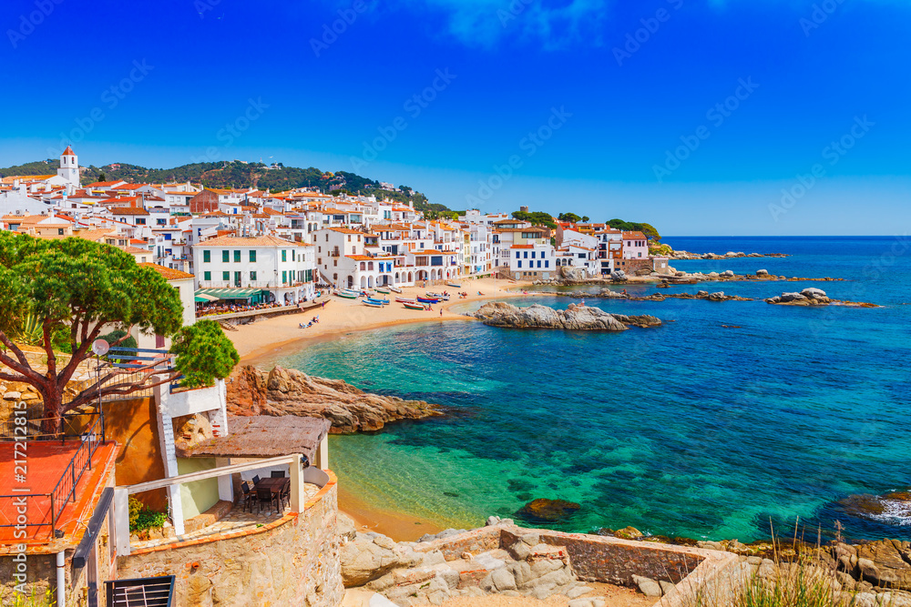 Sea landscape with Calella de Palafrugell, Catalonia, Spain near of Barcelona. Scenic fisherman village with nice sand beach and clear blue water in nice bay. Famous tourist destination in Costa Brava - obrazy, fototapety, plakaty 