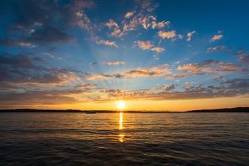 sunset over torch lake in northern michigan