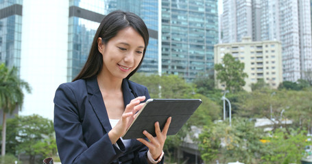 Sticker - Asian Businesswoman use of tablet computer