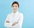 © Tom Wang - Smiling asian woman pharmacist doctor isolated.