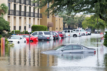 Cars Submerged  In Houston, Texas, US During Hurricane Harvey. Water Could Enter The Engine, Transmission Parts Or Other Places. Disaster Motor Vehicle Insurance Claim Themed. Severe Weather Concept