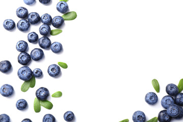 Ripe blueberries on white background