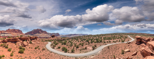 Canvas Print - Panoramic aerial view of windy road across the canyon