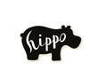 Silhouette of a hippo on a white background. Vector illustration. Calligraphy inscription.