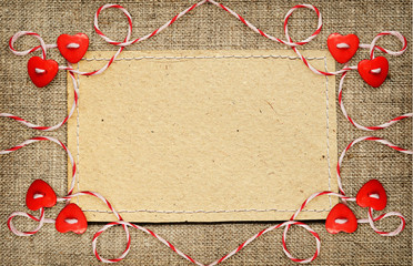 Wall Mural - Red hearts tied with rope on craft paper