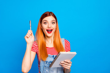 Young girl in red striped T-shirt and a bright lipstick on her l