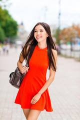 Sticker - Vertical portrait of fascinating and young Asian woman in red mi