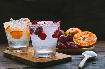 Wall Mural - sweet fruits beverage strawberry soda and orange soda cold drink vitamin fruit, tasty drinks.