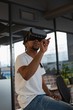 © Wavebreak Media - Excited man experiencing virtual reality