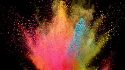 Super slowmotion shot of color powder explosions isolated on black background. Shot with high speed cinema camera at 1000fps