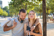 © PhotoGranary - Shopping. Happy young couple with shopping bags in the city of Valence (France).