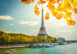 Eiffel Tour over water of Seine river at fall day, Paris, France