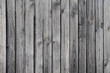 Texture of dark untreated wood, Old wooden laths background, Weathered larch background