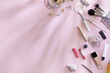 © uv_group - Flat lay and top view of make up products and cosmetics set on pink background with leaves shadow and Hard Light, copyspace. Beauty concept for blogger, pastel women business office table desk