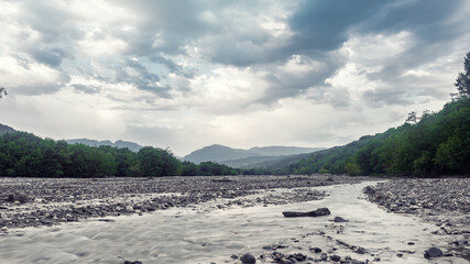 Wall Mural - Riverbed of a fast mountain river