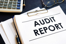 Audit Report With Business Documents In An Office.