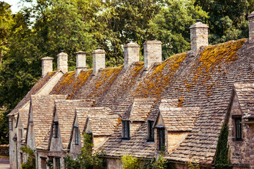 medieval cotswold stone cottages of arlington row in the village of bibury, england