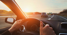 Hands Of Car Driver On Steering Wheel, Road Trip, Driving On Highway Road