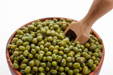 fresh muung beans on a white background