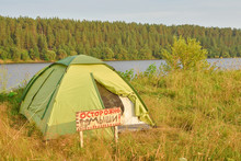 Tent At Sunset, A Tent On The River Bank, A Sign Carefully Mouse