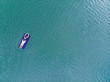 © phpetrunina14 - woman on mattress in azure water. overhead view. copy space