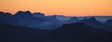 Fototapeta  - Mountain ranges at sunset. View from Mount Niesen.