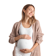 Canvas Print - Happy pregnant woman touching her belly on white background