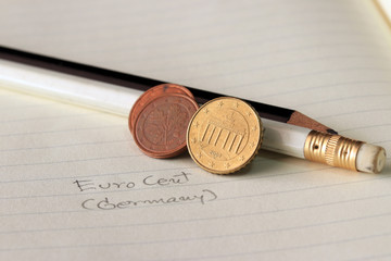 Ten Germany euro cent on obverse, the Brandenburg Gate, symbol of the division of Germany and its subsequent unification, is surrounded with the twelve stars of Europe. and two coin of two euro cent.