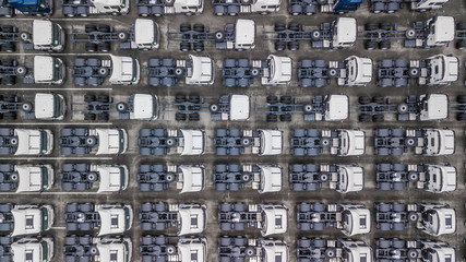 Wall Mural - Aerial top view of white cargo trailer parking, trailer line up for slae.