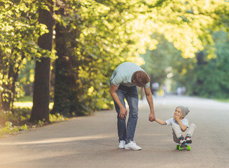 Father and son in summer