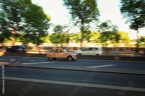Fotografía Paris, France-MAY 06, 2018: Vintage Citroen 2cv rides fast along the street of t